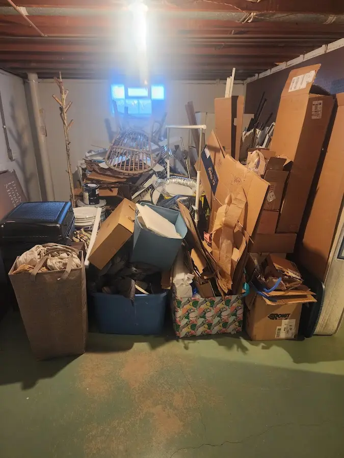 Roll-off dumpster container at job site for 20 Yard Dumpster Rental in Carrollton